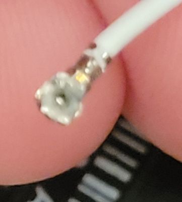 One of the tiny cables of the wifi card got broke, the head of the