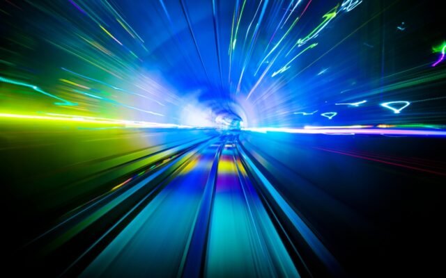 Travelling in a lighted tunnel at speed.