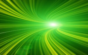 Abstract image in green of light moving in high speed tunnel.