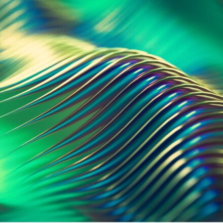 3D digital rendering of light reflecting off a wavy background, creating green, gold, and purple colors.
